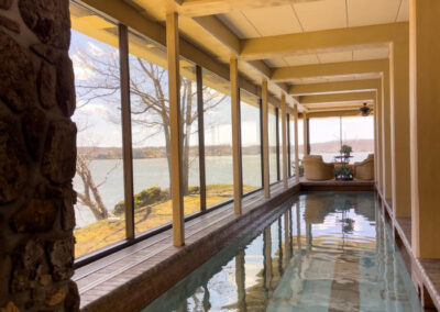 Indoor pool area with clean windows and natural lighting