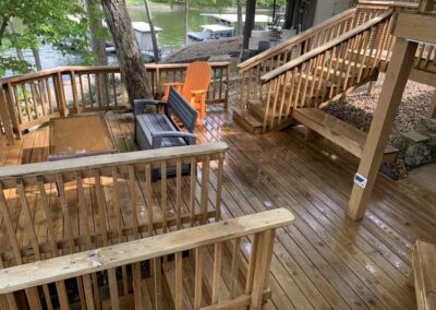 Wood deck after professional soft washing by ClearView Windows