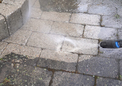 Patio stone cleaning by ClearView Windows showing before/after results